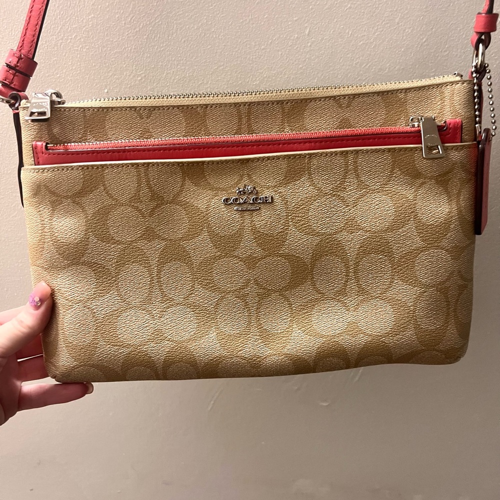 Coach crossbody with removable pink clutch
